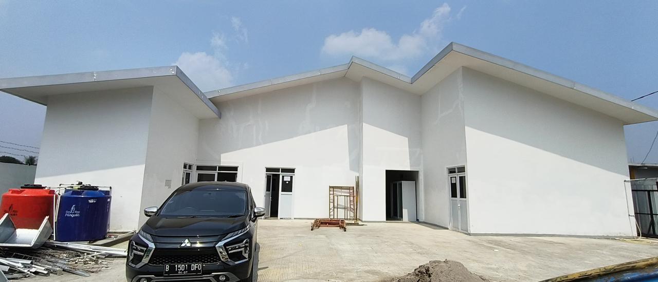 A photo of factory renovations, transforming an industrial space into a state-of-the-art facility.